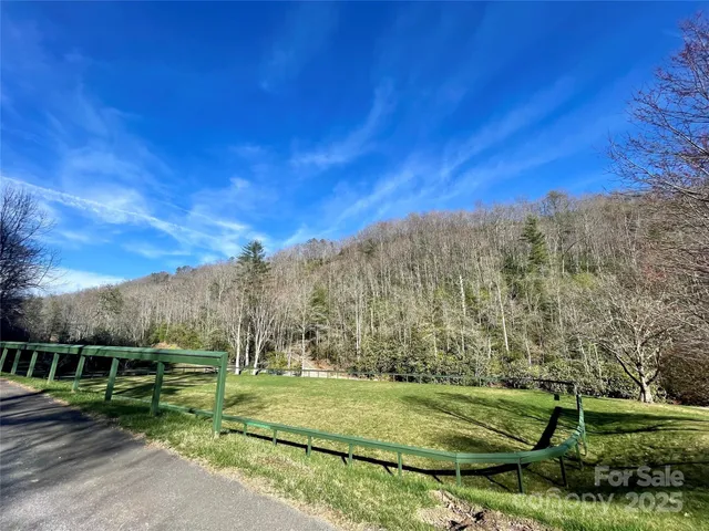 a view of a field with next to a yard