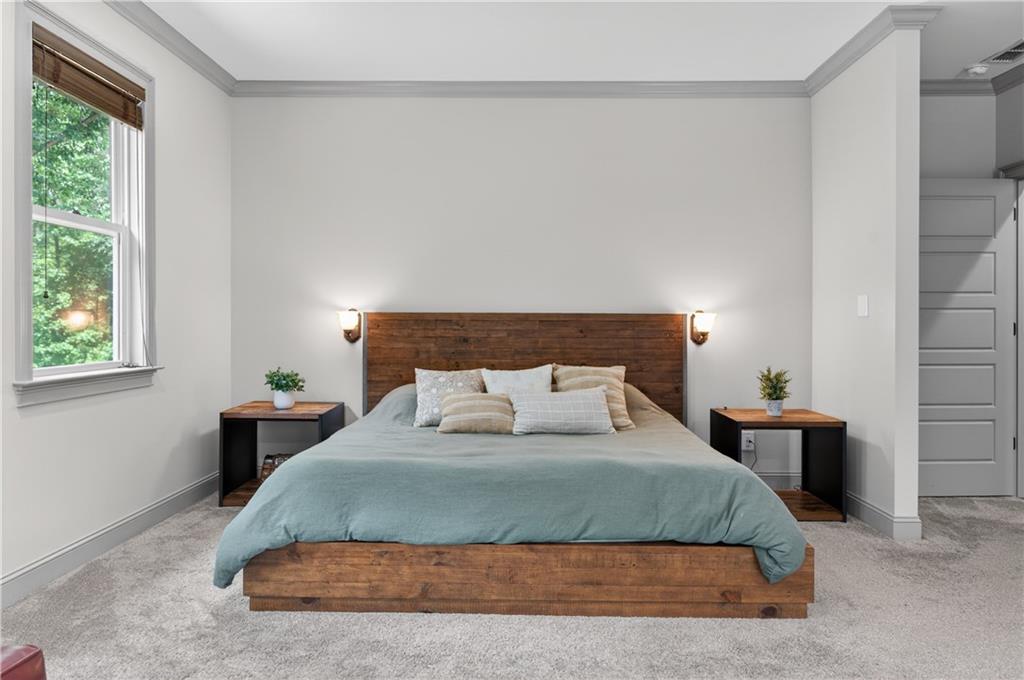 632 Geiger Road Jefferson, GA 30549 - Photo 27 of 55 a bedroom with a bed and window