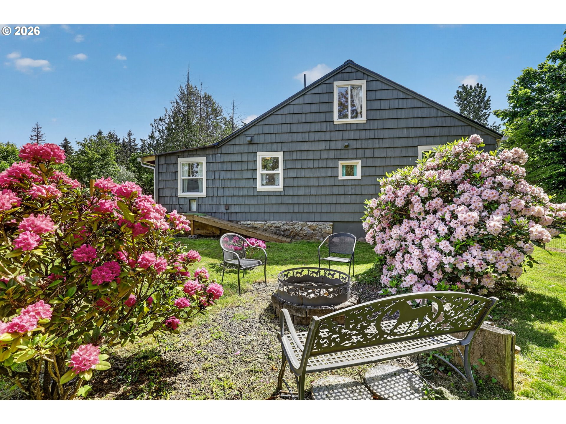 33951 Southeast Coupland Road Estacada, OR 97023 - Photo 29 of 48 a view of a house with a yard and potted plants
