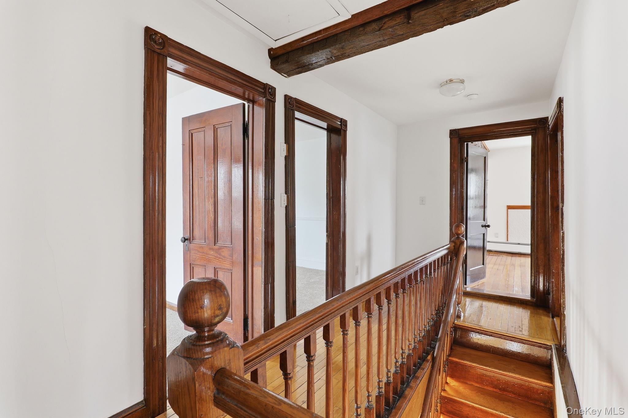 708 Burlingham Road Bloomingburg, NY 12721 - Photo 12 of 25 Stairs, beamed ceiling