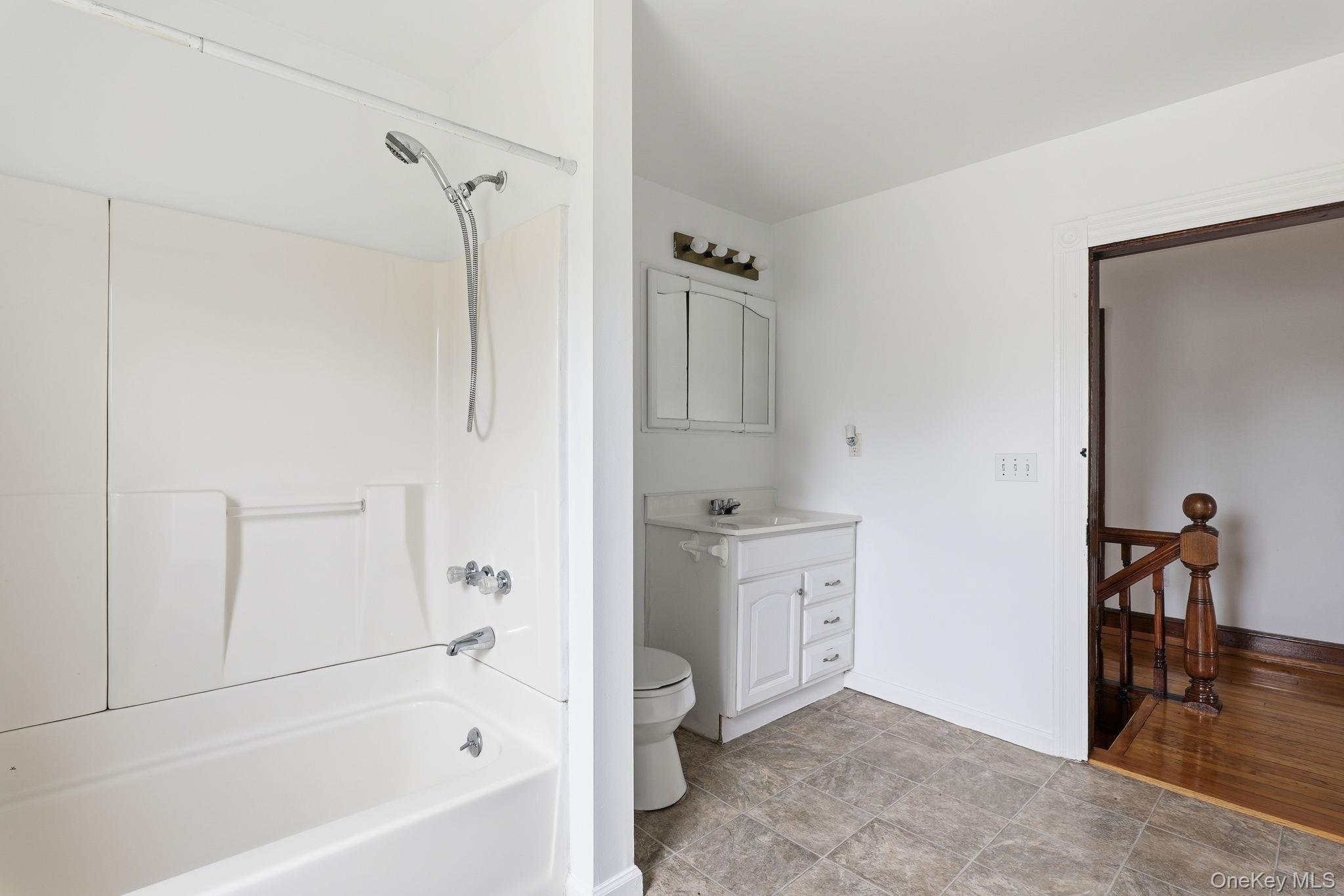 708 Burlingham Road Bloomingburg, NY 12721 - Photo 20 of 25 Bathroom featuring vanity and shower / bath combination