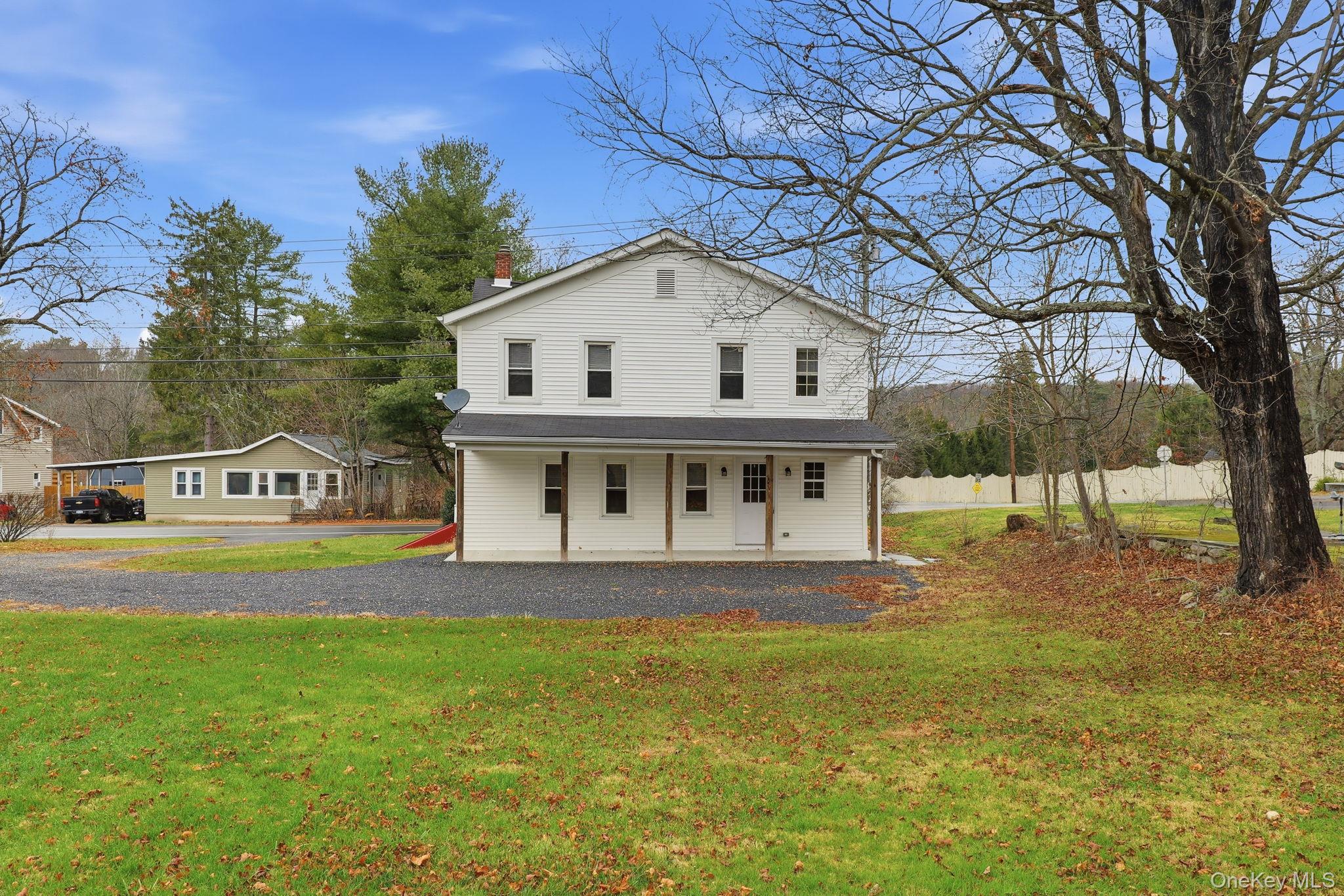 708 Burlingham Road Bloomingburg, NY 12721 - Photo 23 of 25 View of back of home with a chimney and back yard