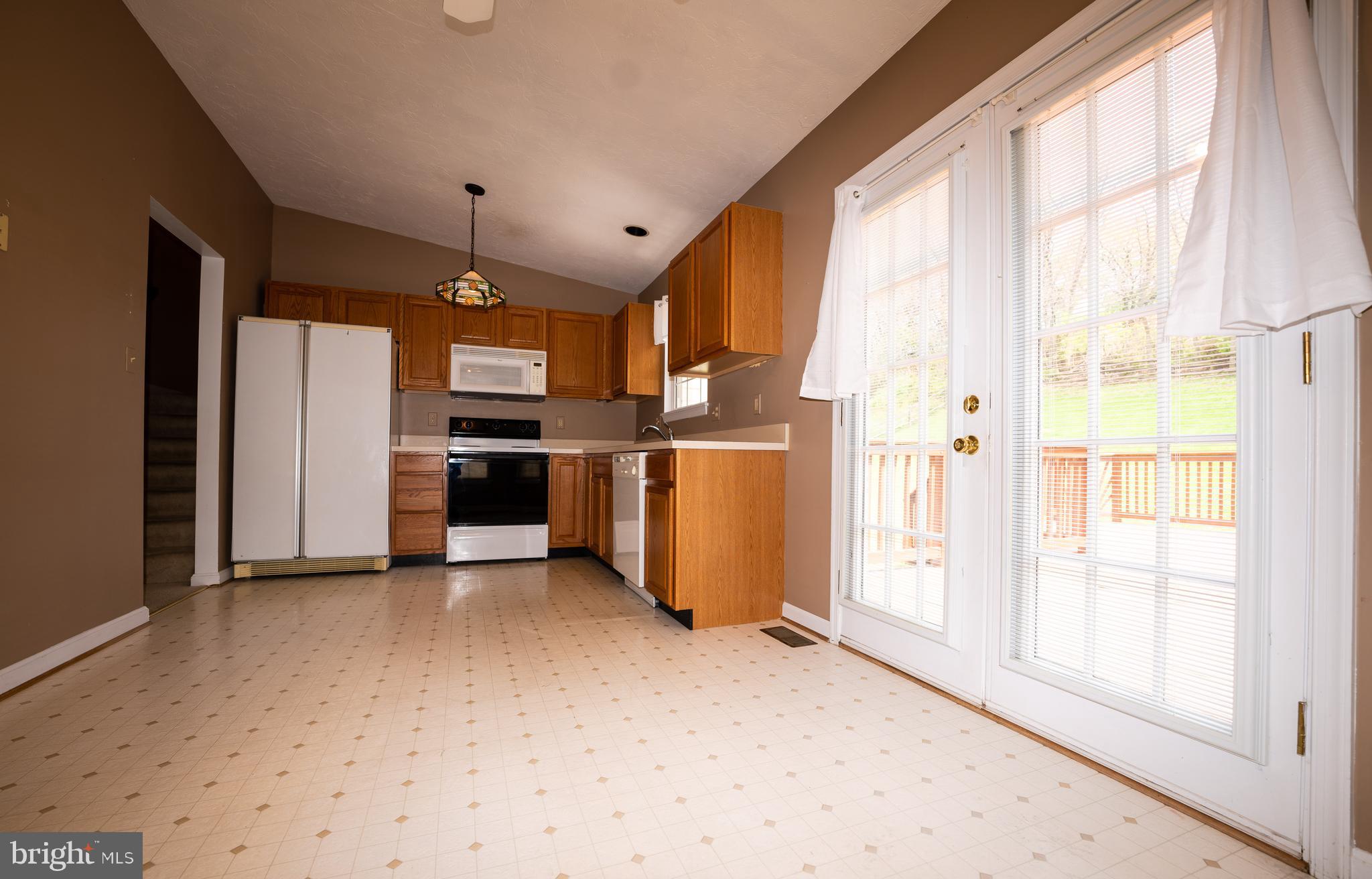 188 Marion Road Westminster, MD 21157 - Photo 17 of 58 kitchen with French doors to deck