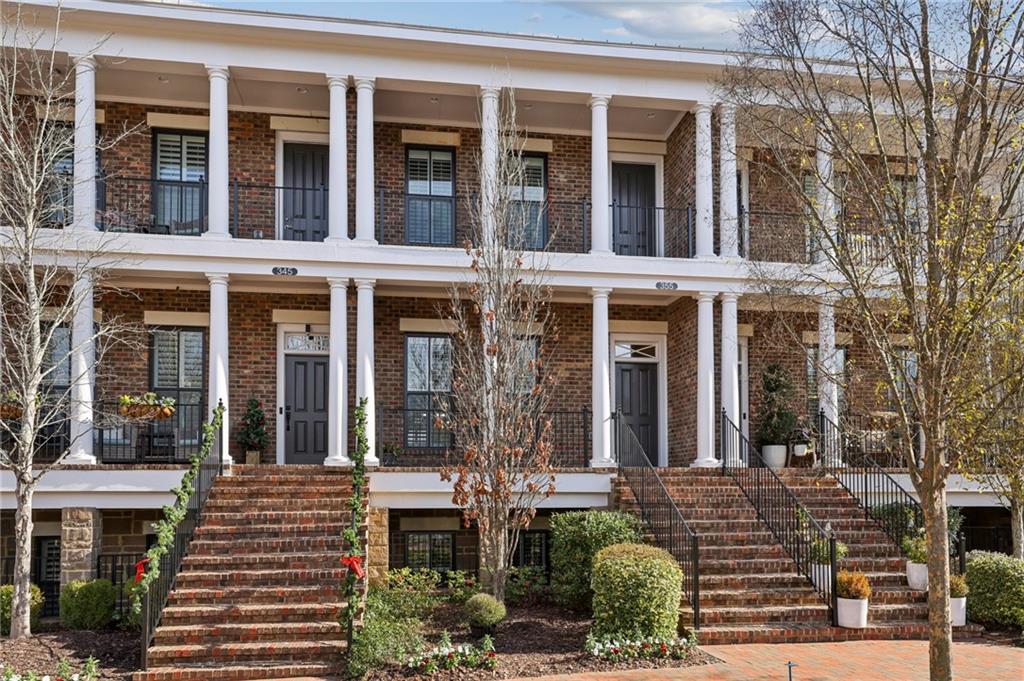 355 Cricket Lane Alpharetta, GA 30009 - Photo 2 of 39 front view of a brick building