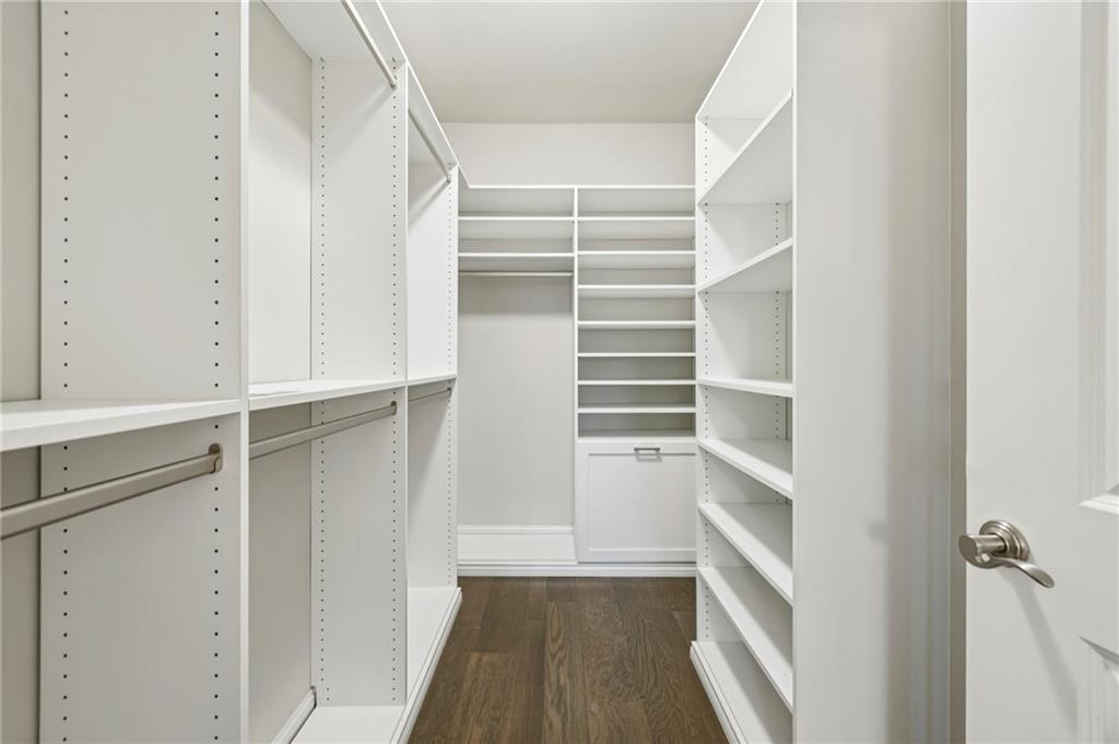 355 Cricket Lane Alpharetta, GA 30009 - Photo 26 of 39 a view of walk in closet with empty racks