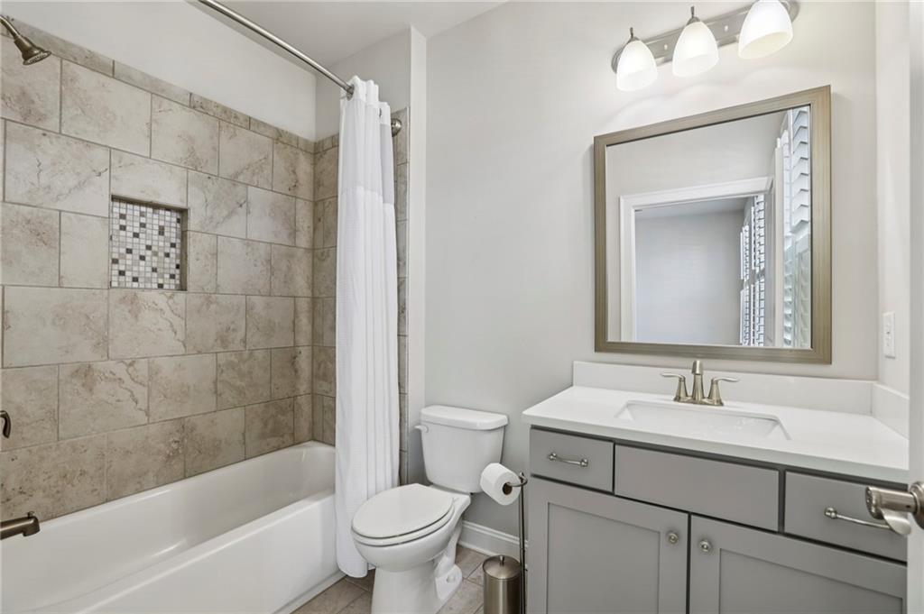 355 Cricket Lane Alpharetta, GA 30009 - Photo 30 of 39 a bathroom with a sink toilet and shower