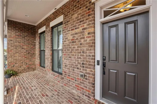 a view of a brick house with a door