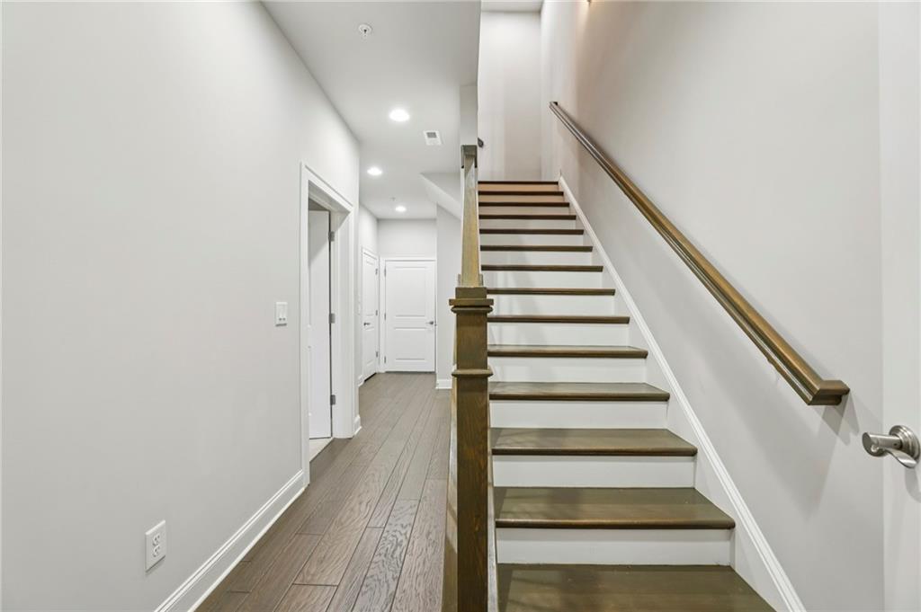 355 Cricket Lane Alpharetta, GA 30009 - Photo 34 of 39 a view of entryway and gallery with wooden floor
