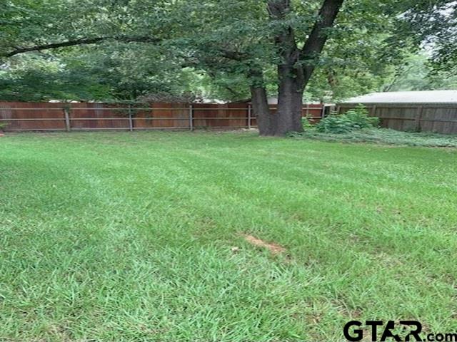 304 Lakeview Street Whitehouse, TX 75791 - Photo 16 of 17 a view of a backyard