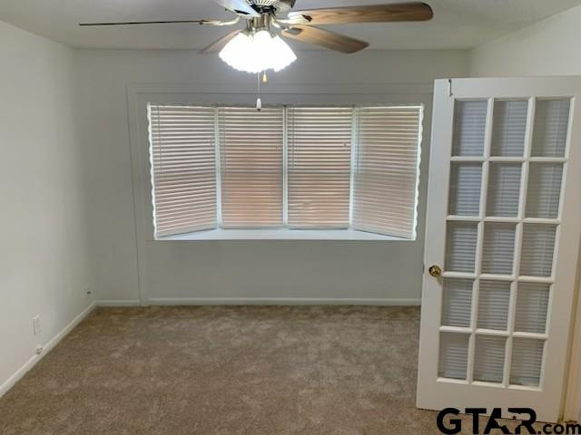 304 Lakeview Street Whitehouse, TX 75791 - Photo 8 of 17 a view of empty room with windows