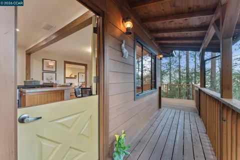 a view of a living room with a large window