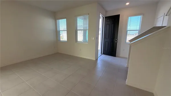 an empty room with windows