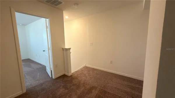 an empty room with closet