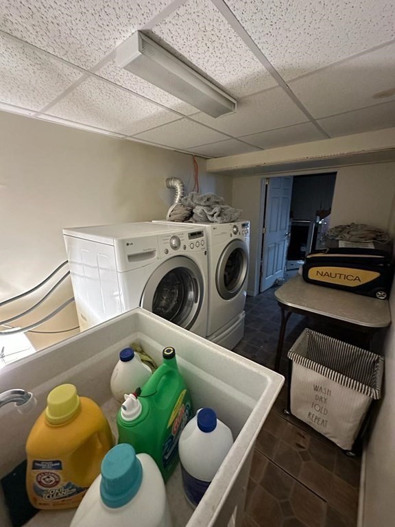 85-87 Windemere Street Springfield, MA 01104 - Photo 23 of 25 a utility room with dryer and washer
