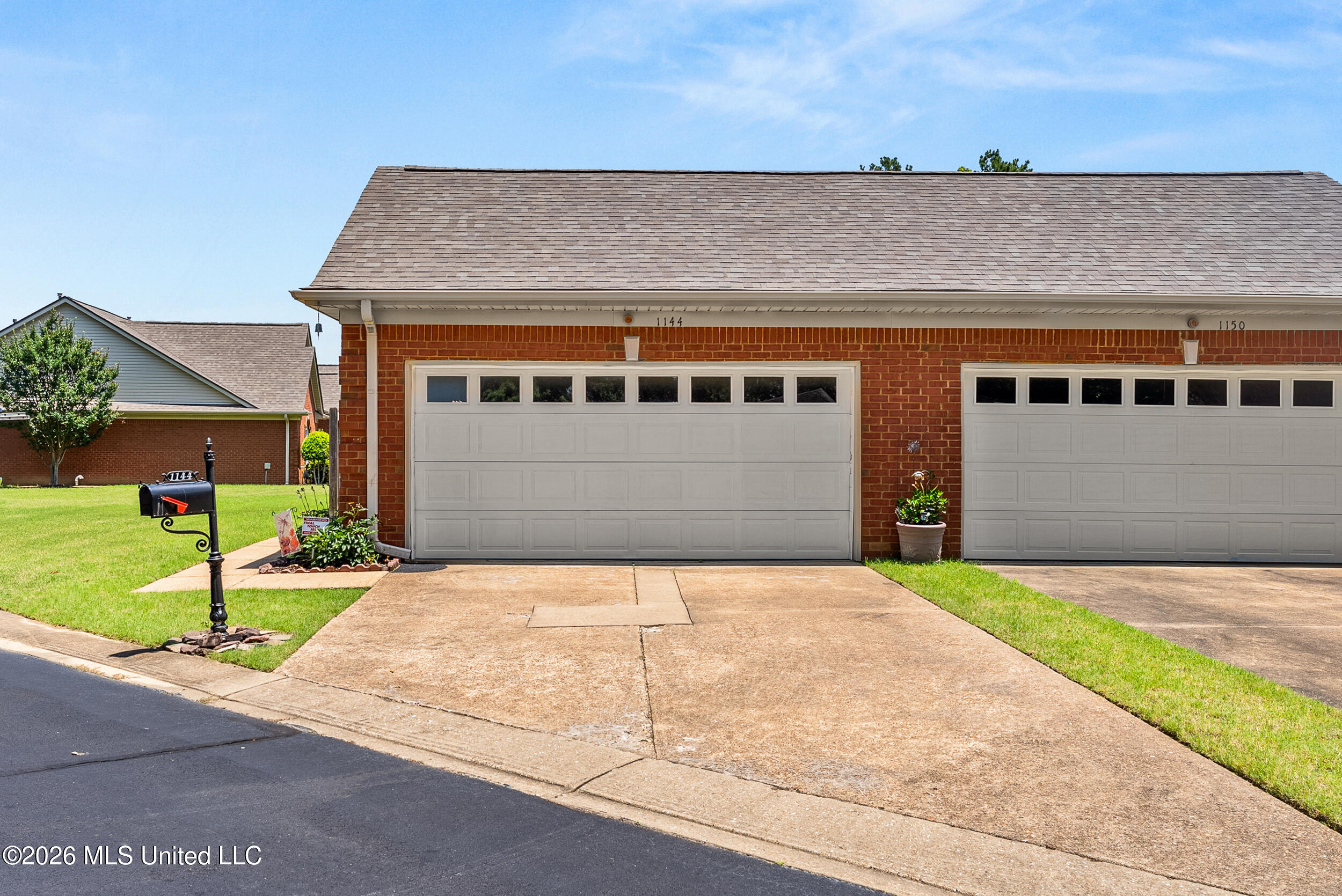 1144 Martin Circle North Hernando, MS 38632 - Photo 4 of 24 Rear - Garage and Parking Pad