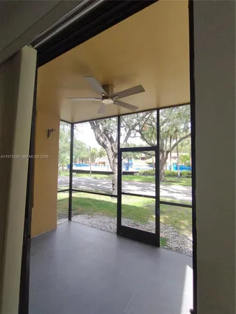an empty room with windows and view
