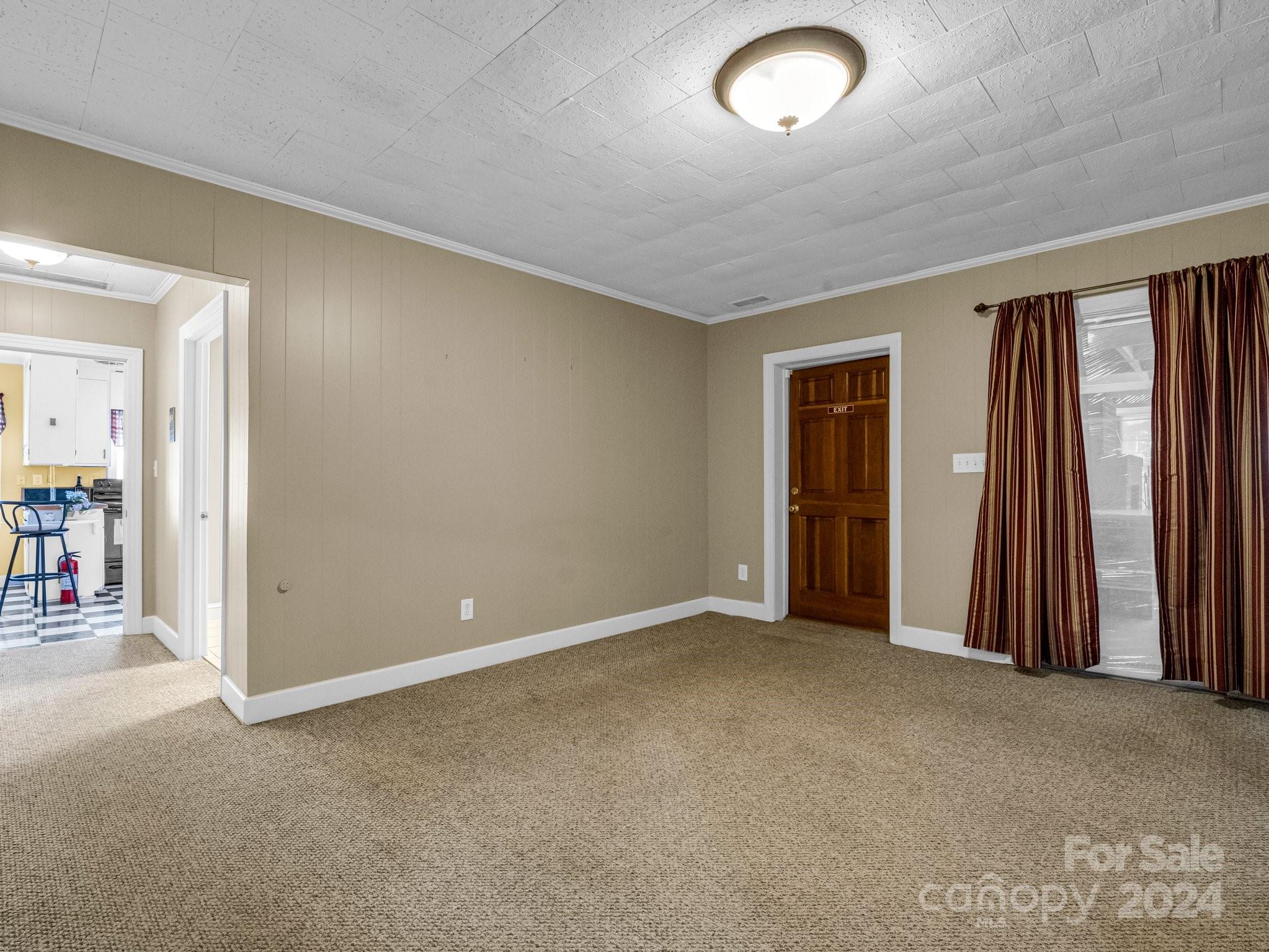 349 North Main Street Rutherfordton, NC 28139 - Photo 18 of 27 an empty room with windows and view of bathroom