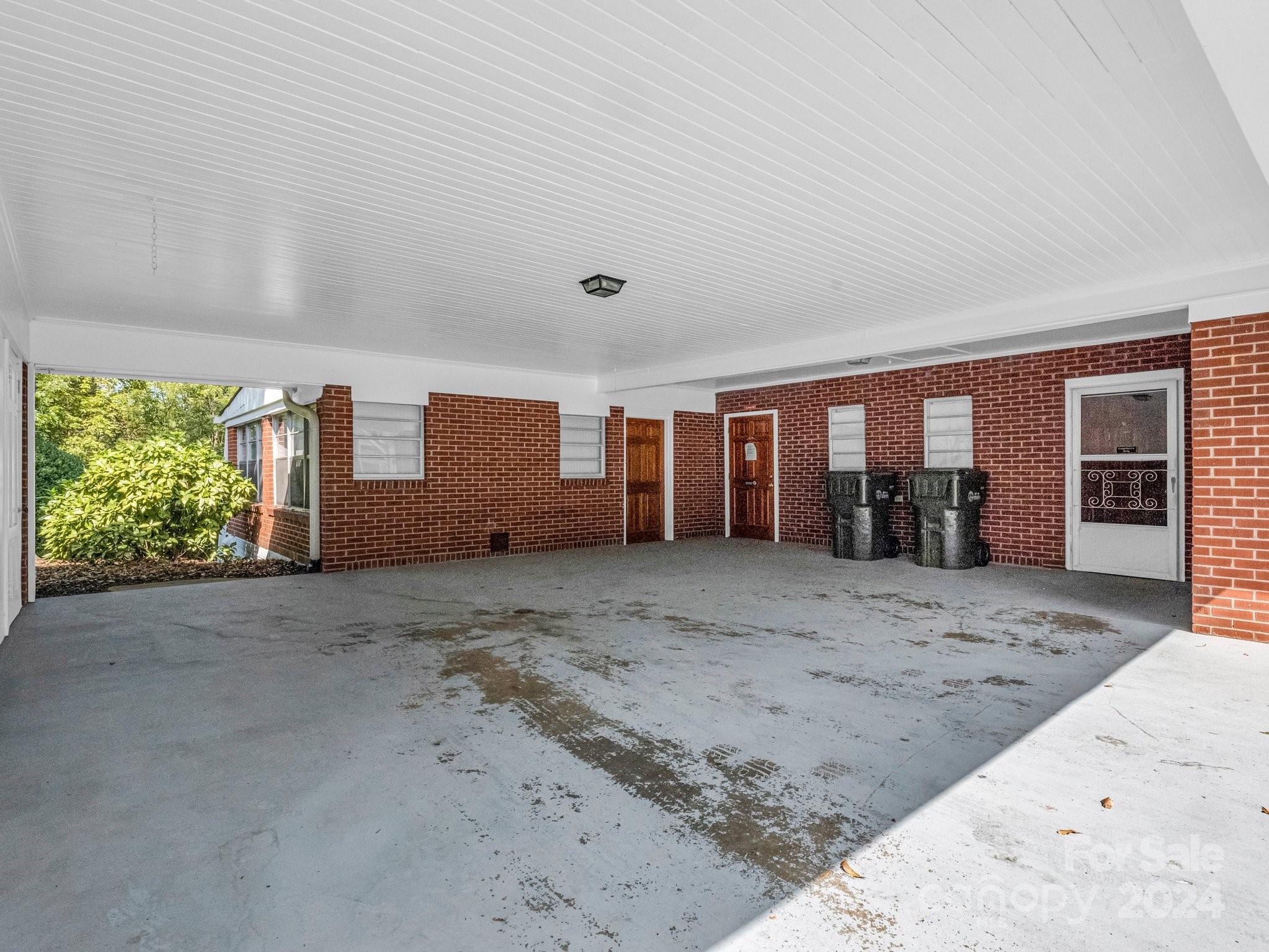 349 North Main Street Rutherfordton, NC 28139 - Photo 8 of 27 a view of a house with a backyard