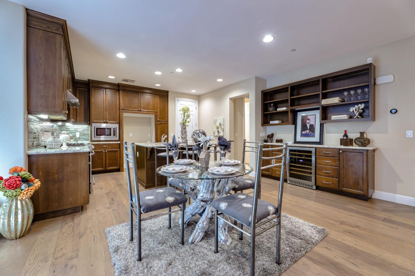 1000 South Monarch Road San Ramon, CA 94582 - Photo 13 of 23 a kitchen with stainless steel appliances kitchen island granite countertop a refrigerator and cabinets