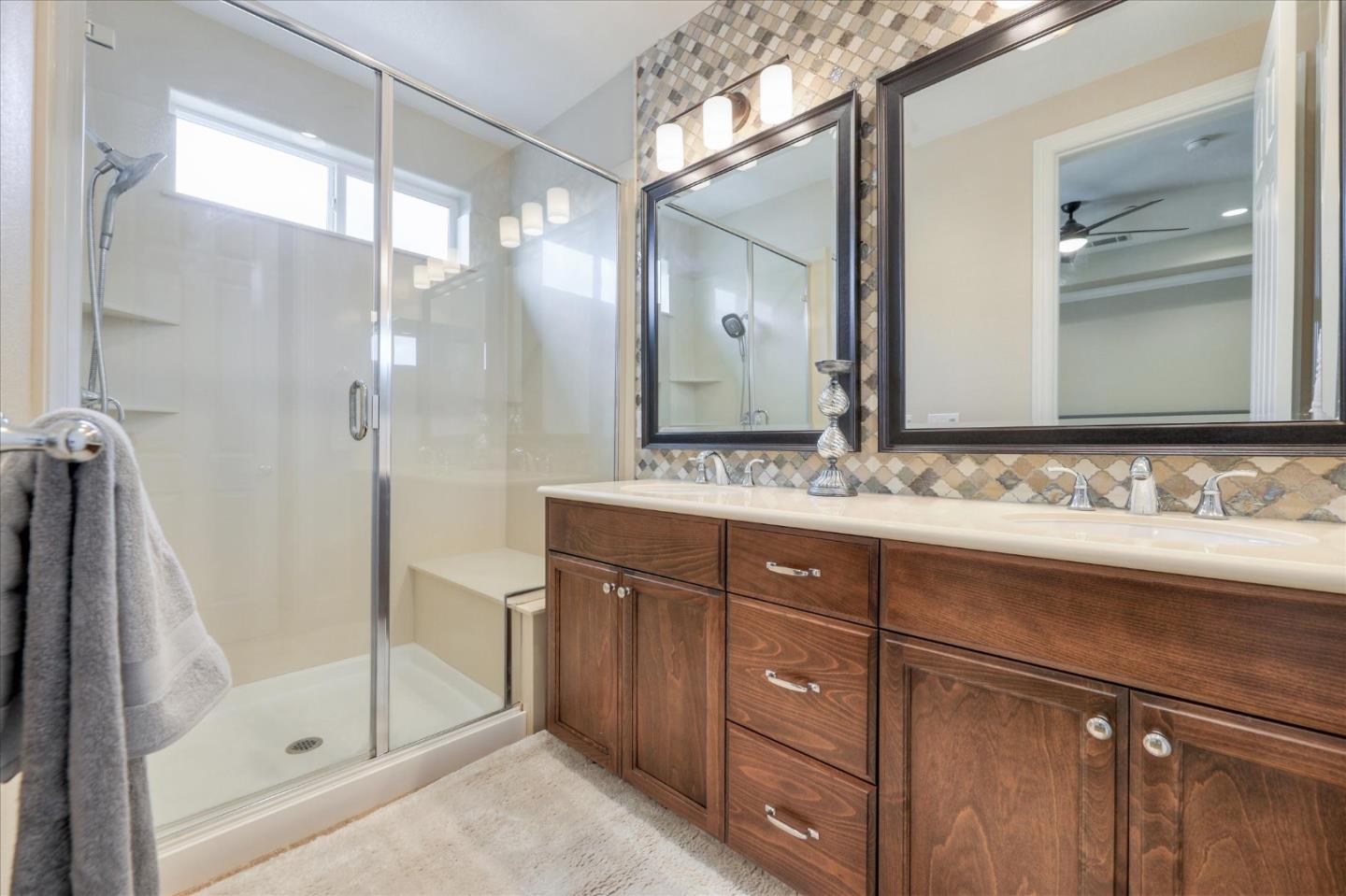 1000 South Monarch Road San Ramon, CA 94582 - Photo 19 of 23 a bathroom with a sink and a mirror