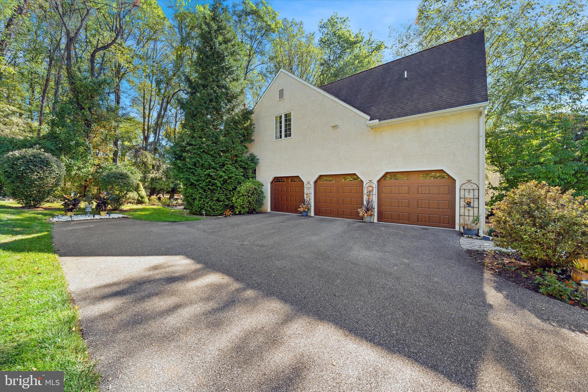 101 Ridings Boulevard Chadds Ford, PA 19317 - Photo 33 of 38 3 Car Garage with new doors