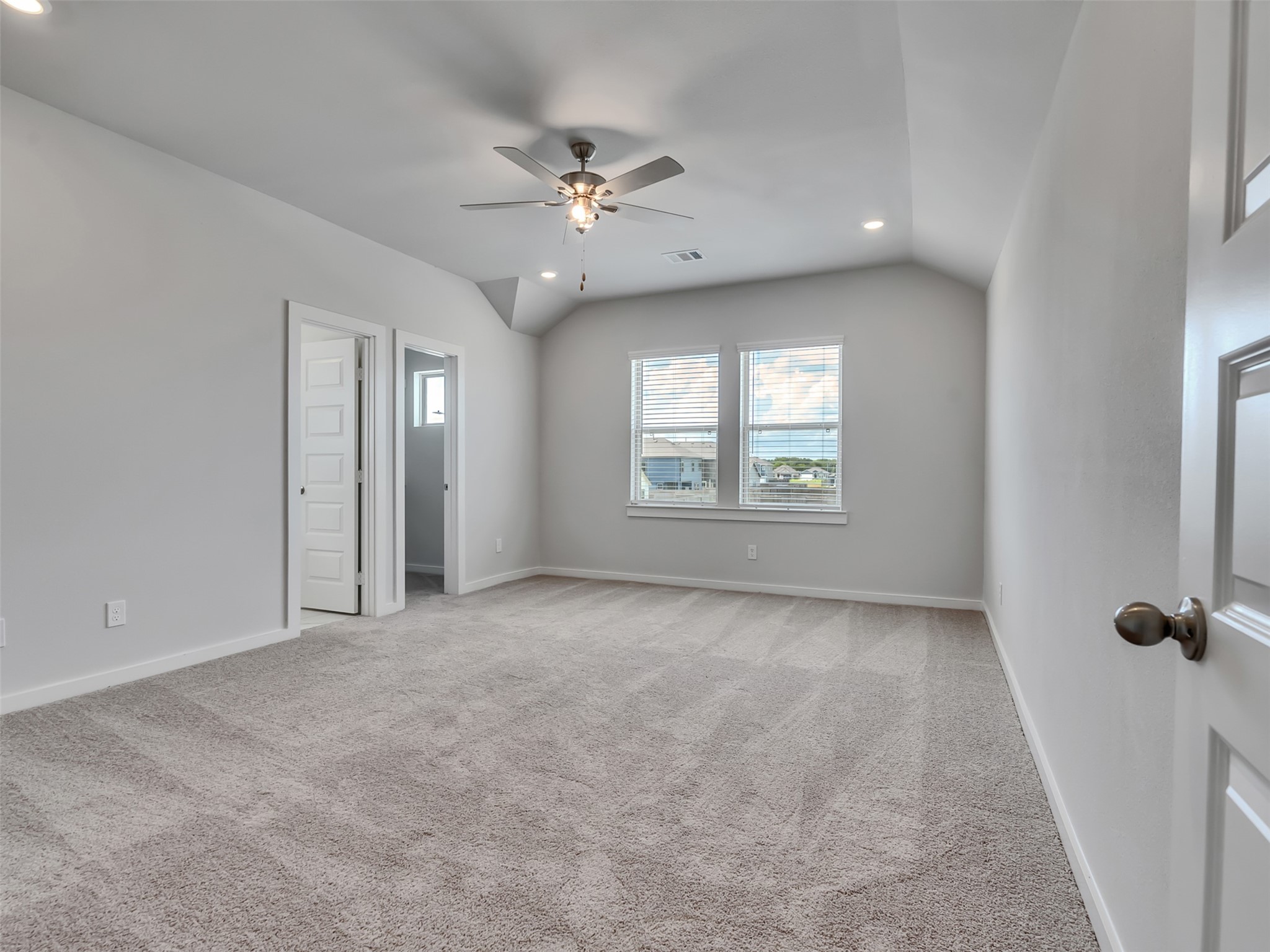 1206 Elsinore Drive Rosharon, TX 77583 - Photo 12 of 21 an empty room with windows and fan