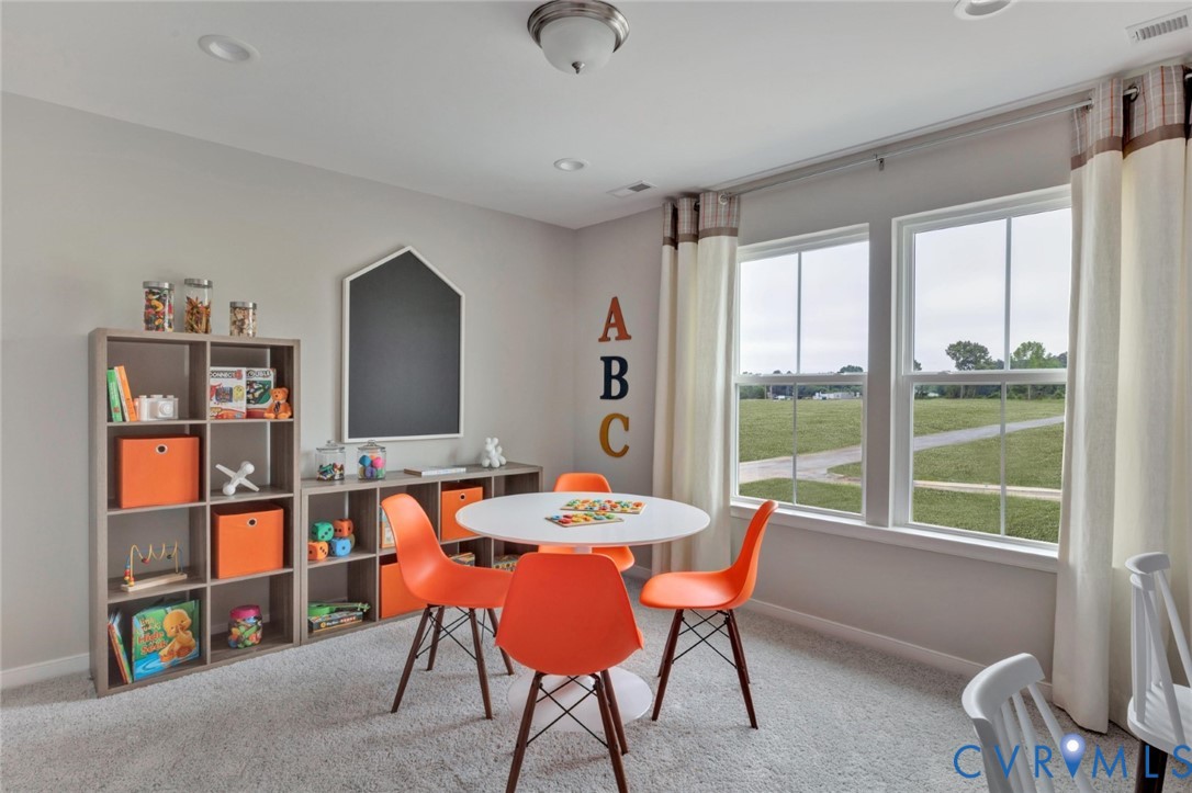 967 Charlemagne Road Midlothian, VA 23114 - Photo 18 of 50 a view of a workspace with furniture and a window