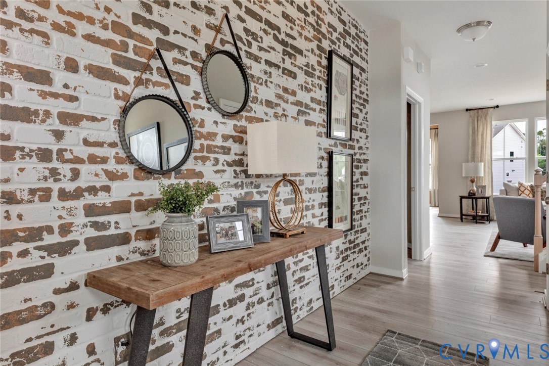 967 Charlemagne Road Midlothian, VA 23114 - Photo 2 of 50 a view of a dining room with furniture and wooden floor