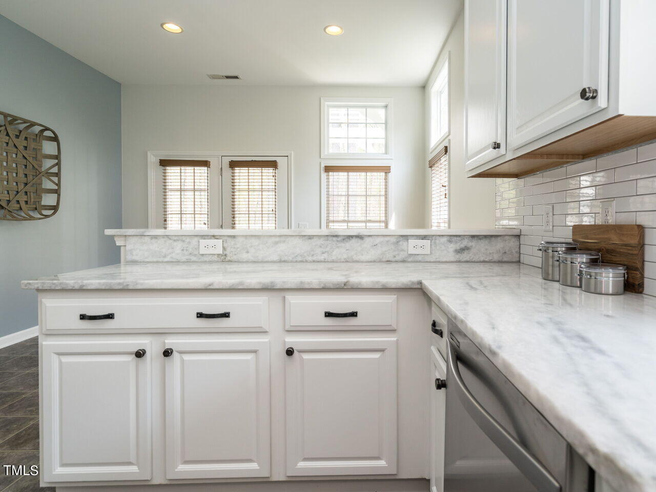16 Richardson Circle Durham, NC 27713 - Photo 11 of 35 a view of a kitchen with granite countertop white cabinets and a sink