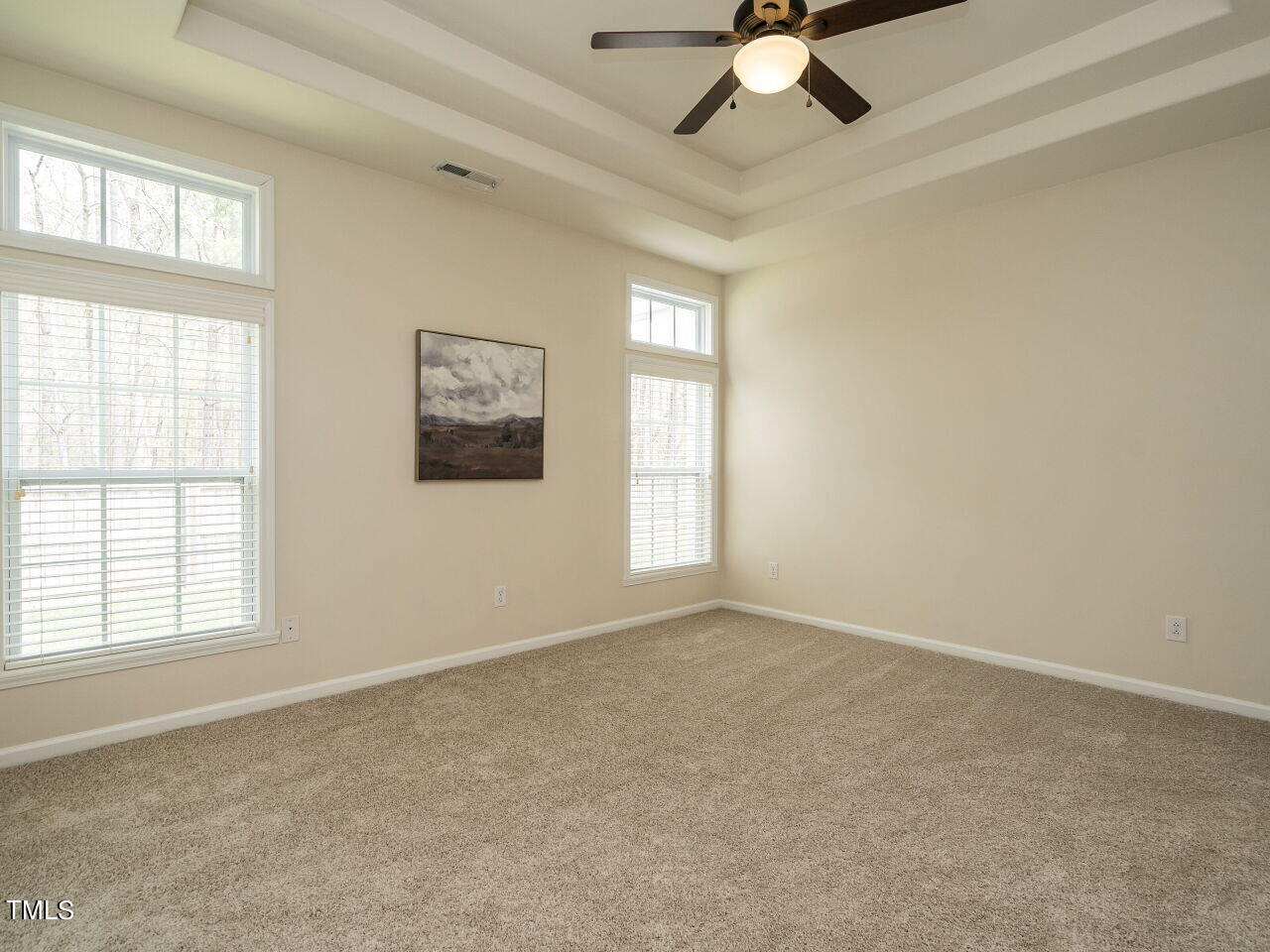 16 Richardson Circle Durham, NC 27713 - Photo 16 of 35 an empty room with windows and fan