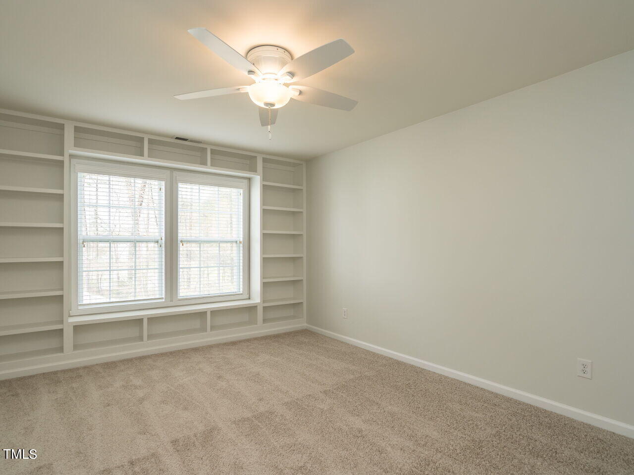 16 Richardson Circle Durham, NC 27713 - Photo 20 of 35 an empty room with chandelier fan and windows