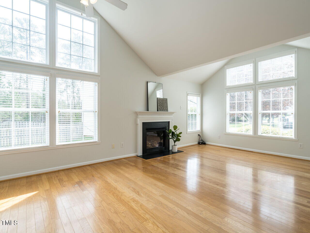 16 Richardson Circle Durham, NC 27713 - Photo 5 of 35 a view of an empty room with window and fire place