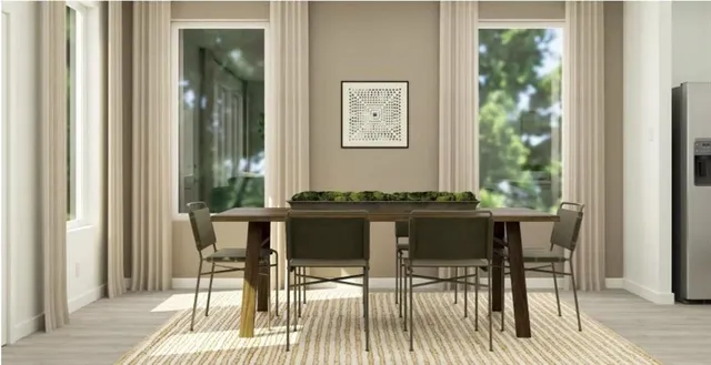 a kitchen with sink and refrigerator