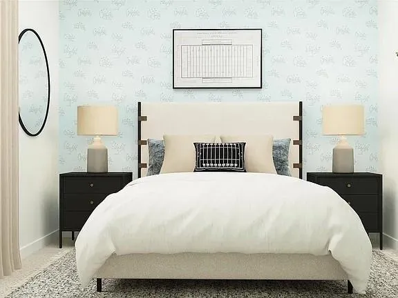 a bedroom with a bed and lamps