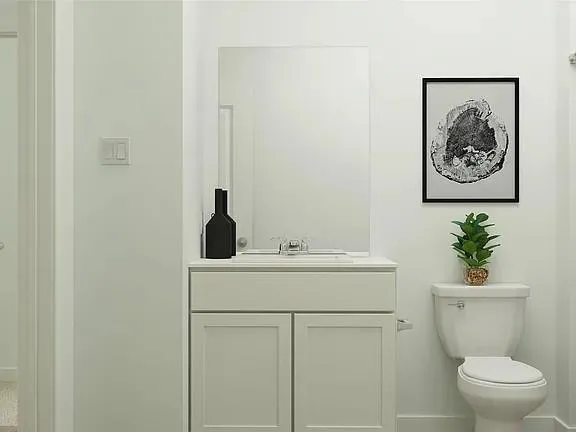 a bedroom with a bed and a lamp