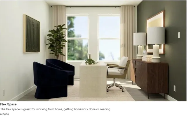 a bedroom with a baby bed a couch and chair