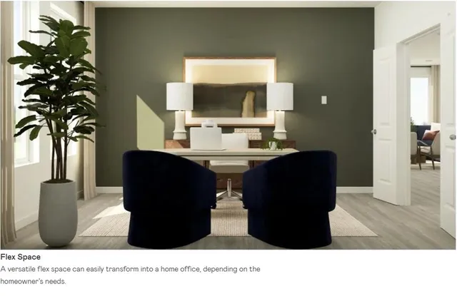 a view of a bedroom with wooden floor and furniture
