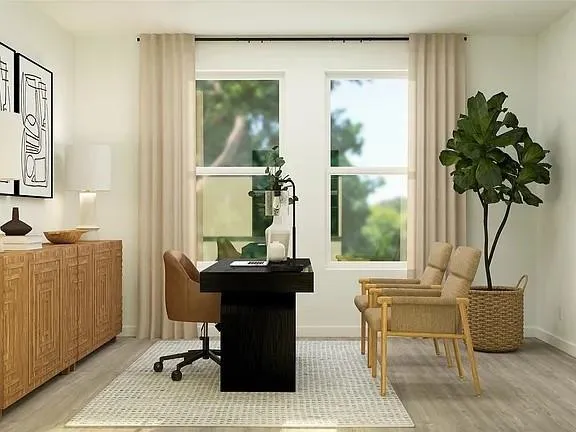 a dining room with furniture and window