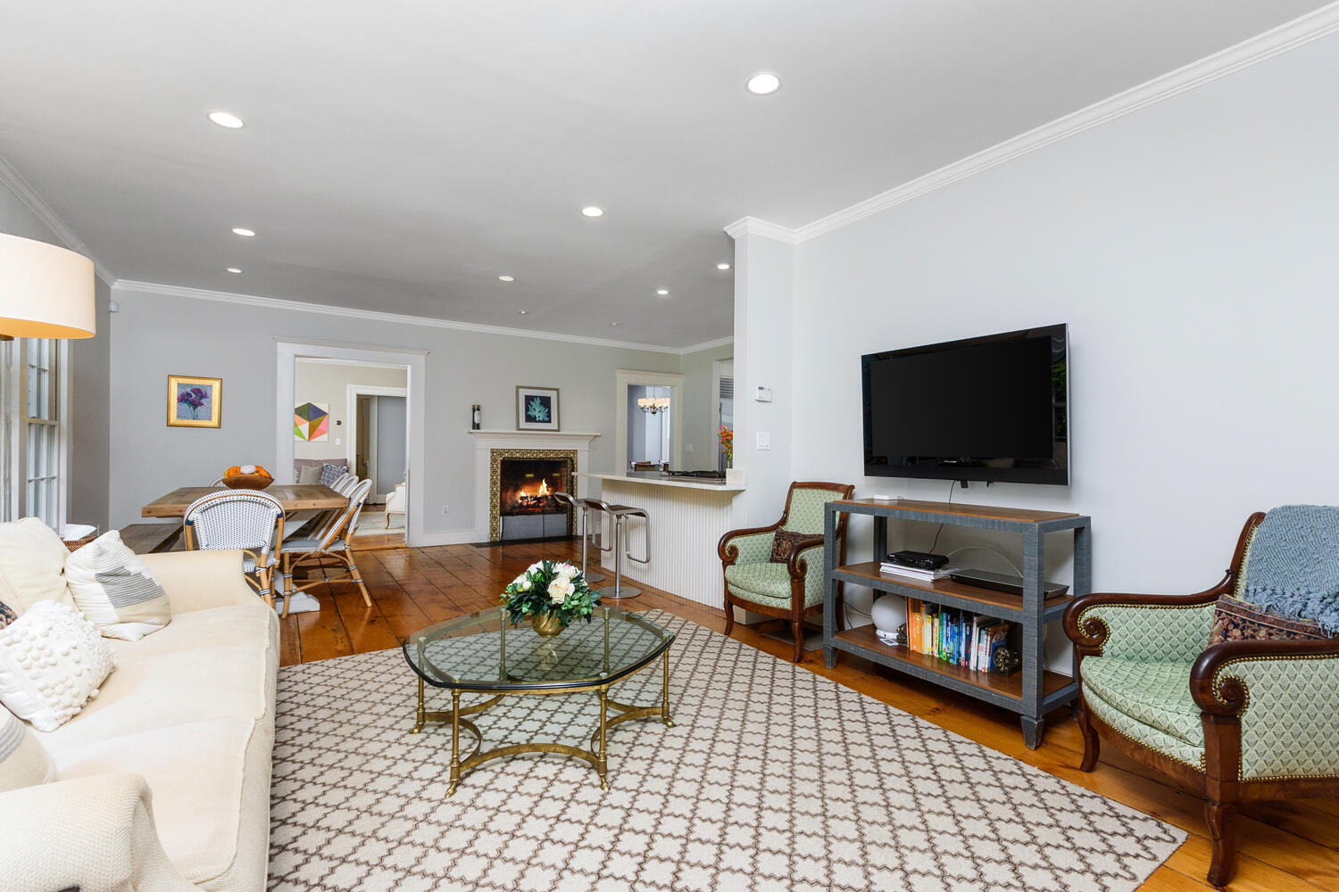 44 Brookside Road Darien, CT 06820 - Photo 18 of 36 a living room with furniture and a flat screen tv
