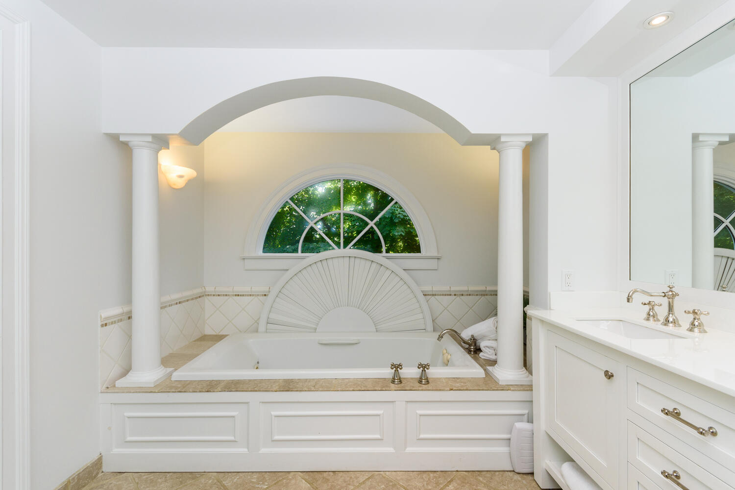 44 Brookside Road Darien, CT 06820 - Photo 23 of 36 a bathroom with a sink and a mirror