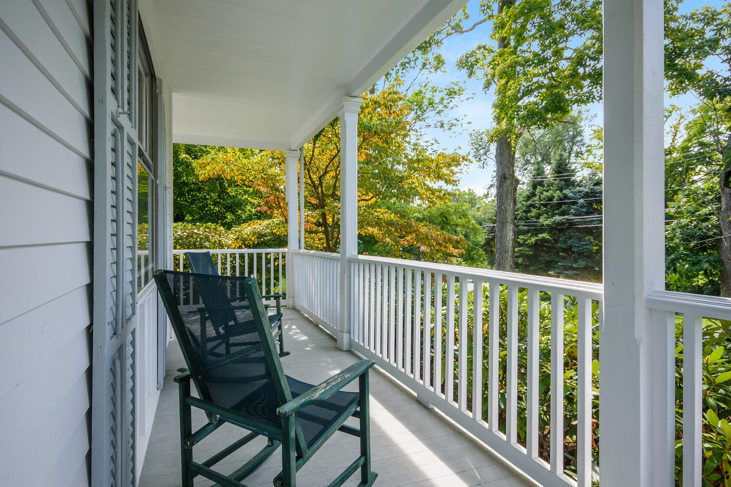 44 Brookside Road Darien, CT 06820 - Photo 6 of 36 a view of a two chairs in the balcony