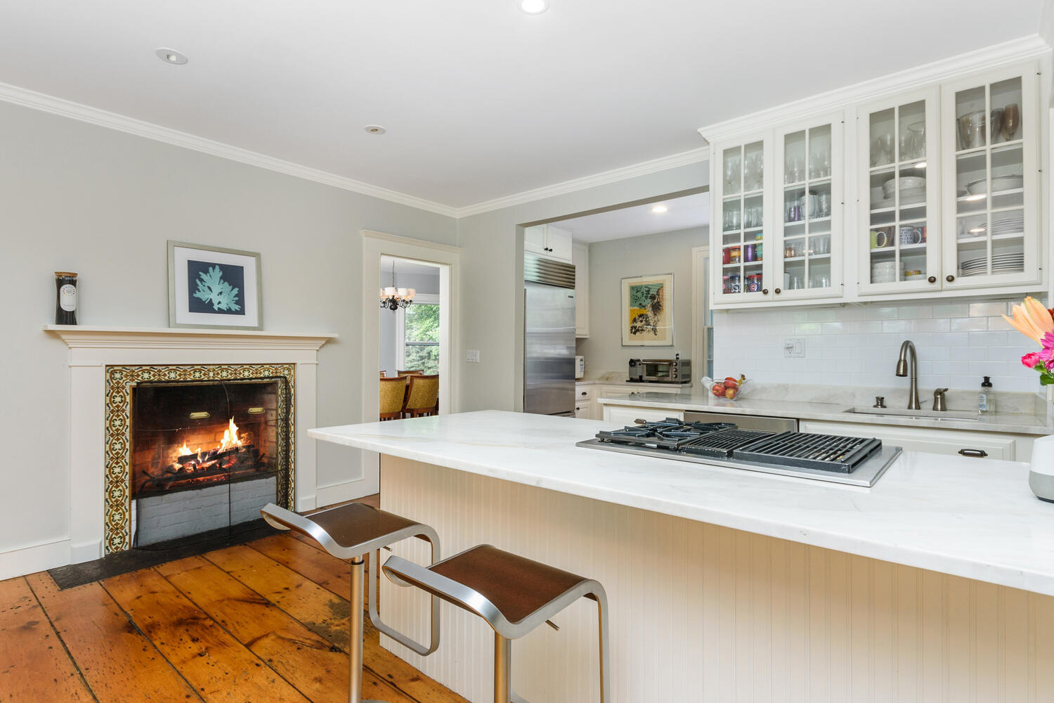 44 Brookside Road Darien, CT 06820 - Photo 8 of 36 a kitchen with furniture and a fireplace