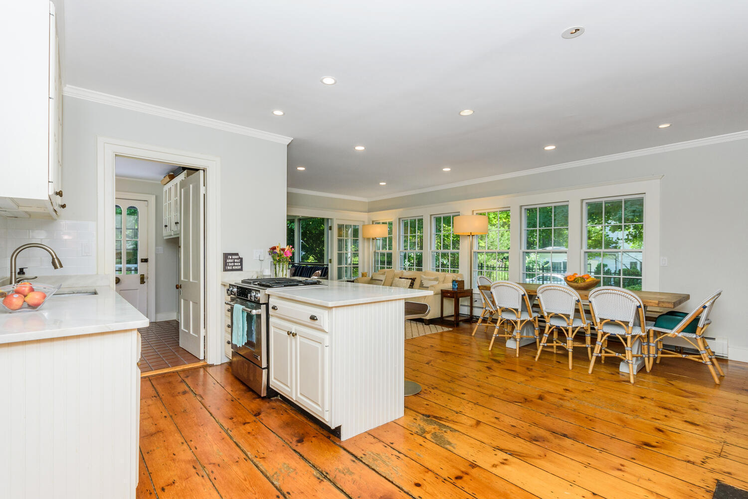44 Brookside Road Darien, CT 06820 - Photo 10 of 36 a dining hall with stainless steel appliances granite countertop a stove and a dining table chair