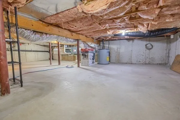 a view of empty room with wooden ceiling