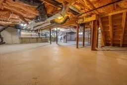 a view of a room with wooden walls