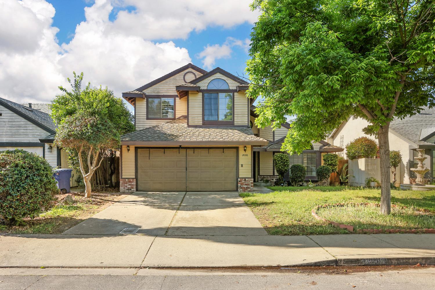 2008 Sheldon Drive Modesto, CA 95350 - Photo 1 of 39 a front view of a house with a garden
