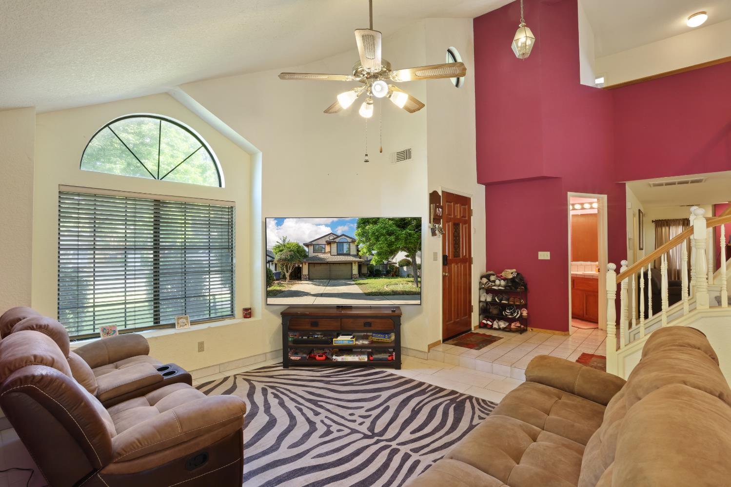 2008 Sheldon Drive Modesto, CA 95350 - Photo 18 of 39 a living room with furniture a fireplace and a large window