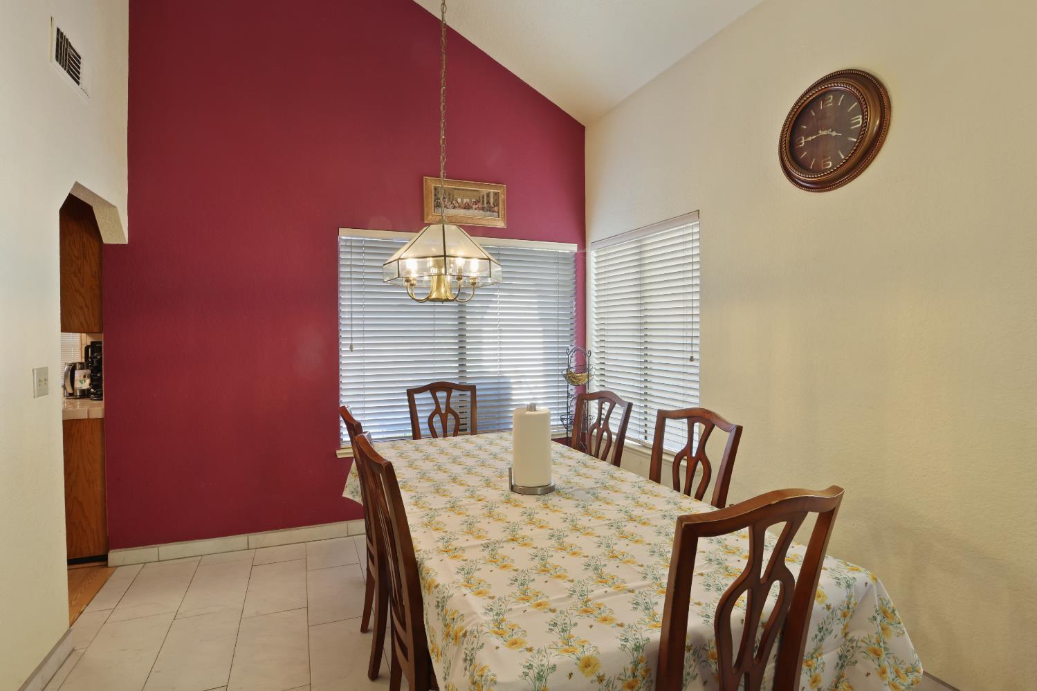 2008 Sheldon Drive Modesto, CA 95350 - Photo 19 of 39 a view of a dining room with furniture and a chandelier