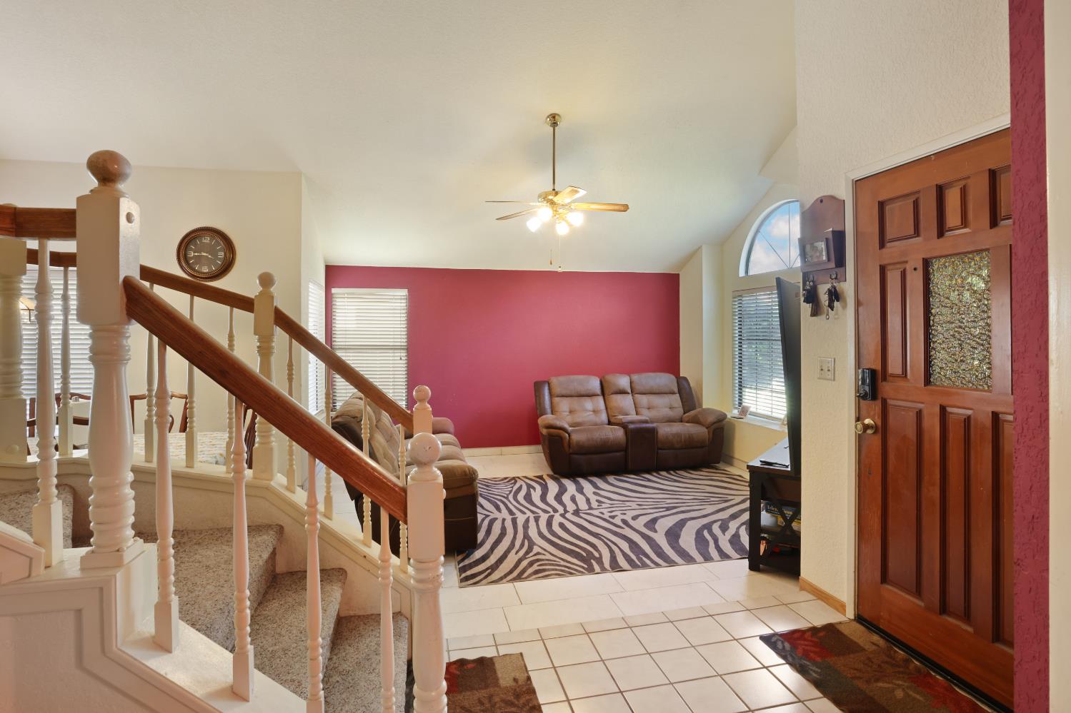 2008 Sheldon Drive Modesto, CA 95350 - Photo 20 of 39 a bedroom with furniture and a chandelier
