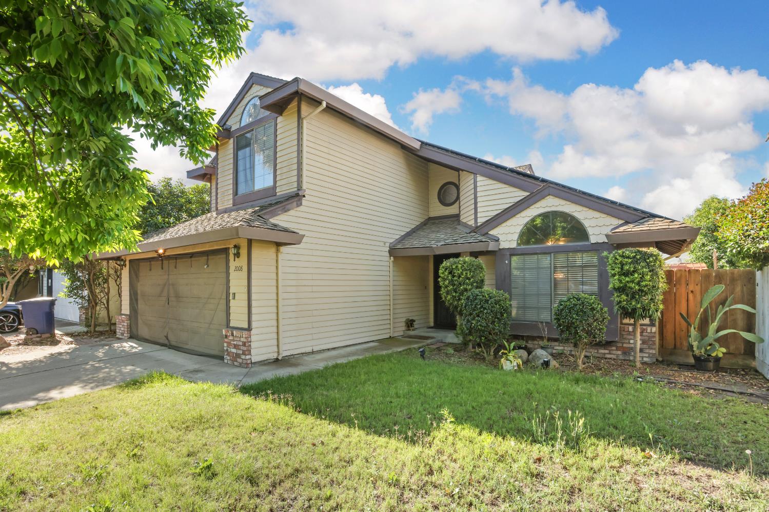 2008 Sheldon Drive Modesto, CA 95350 - Photo 2 of 39 a front view of a house with garden